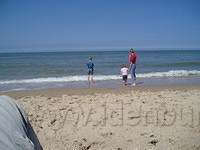 Domburg - Het strand, met Ruurd's knie.
